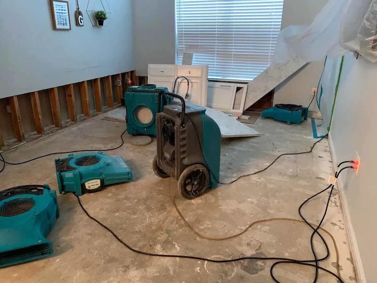 Dehumidifier in flood-cut room for Water Damage Restoration in Springdale